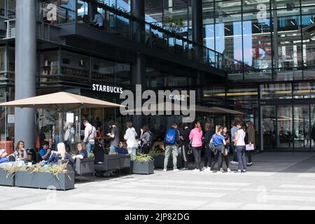 The first Starbucks coffee store in Serbia, people standing in line outside Starbucks. Stock Photo