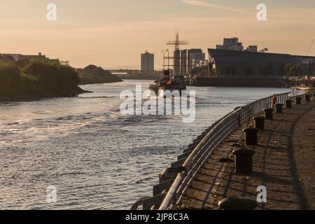 The paddle steamer Waverley on the River Clyde heading down river for an excursion. Stock Photo