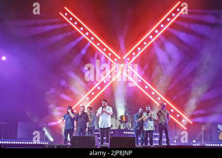 Huelva, Spain - May 25, 2022: The singer Manuel Carrasco in a concert in his home town, Isla Cristina, in Huelva, Andalucia, Spain Stock Photo