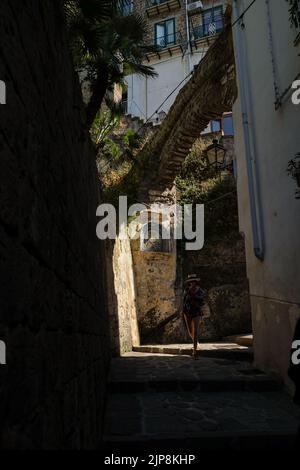 The Madonnelle shrine of Ave Maria in Sorrento on the path between Marina Grande catches the afternoon sun in the narrow streets of Sorrento. Stock Photo