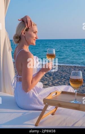 Drinks tray wine rest restaurant sea two copyspace summer cold, for provence background for travel from blue tropical, tourism wineglass. Dinner Stock Photo