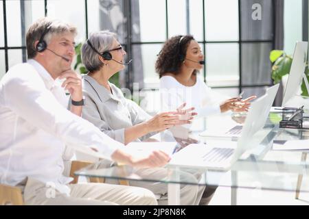 Business group working in customer and help desk office Stock Photo