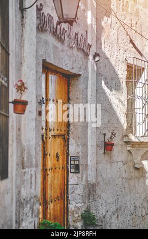 Historic streets of Yanahuara in the city of Arequipa, Peru. Arequipa architecture is characterized by the use of volcanic stone, ashlar. Stock Photo
