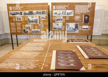 16 August 2022, Schleswig-Holstein, Schleswig: Books with witness statements lie on a table in the Schleswig-Holstein State Archives. On August 17, 2022, the exhibition 'Heinz Reinefarth. From Nazi War Criminal to Member of the State Parliament' will open. Reinefarth was a German lieutenant general in the Waffen SS and was responsible for, among other things, the suppression of the Warsaw Uprising, in which tens of thousands of civilians were shot under his command. Reinefarth was never prosecuted for his actions. He managed to embark on a political career, becoming a member of the Schleswig-H
