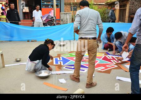 Nepalese drawing made rangoli symbol from powder or sand paint color art for nepali people respect praying rite to deity in diwali festival of lights Stock Photo