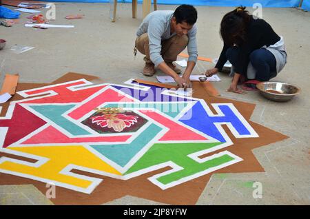 Nepalese drawing made rangoli symbol from powder or sand paint color art for nepali people respect praying rite to deity in diwali festival of lights Stock Photo