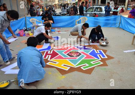 Nepalese drawing made rangoli symbol from powder or sand paint color art for nepali people respect praying rite to deity in diwali festival of lights Stock Photo