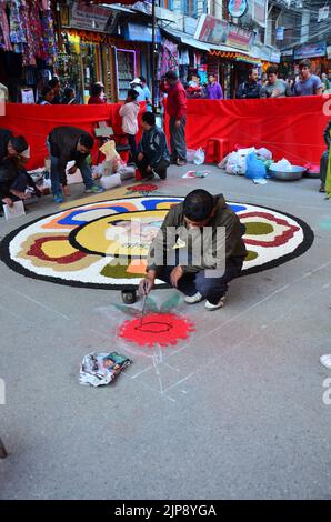 Nepalese drawing made rangoli symbol from powder or sand paint color art for nepali people respect praying rite to deity in diwali festival of lights Stock Photo