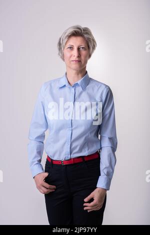 business photo. woman in a blue shirt Stock Photo