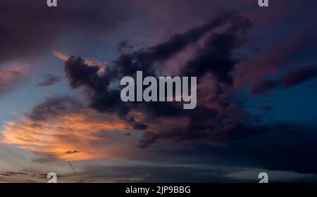 Expressive dramatic cloudscape with vibrant colors Stock Photo