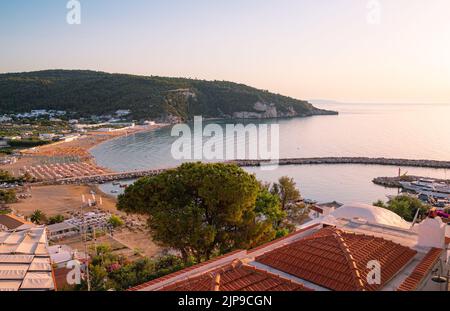 Scenic sunset view over bay and port of Peschici, Gargano, Apulia, Italy Stock Photo