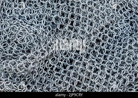 Chain Mail background texture which was used as body armour in war and battle from Roman to medieval period in history, stock photo image Stock Photo