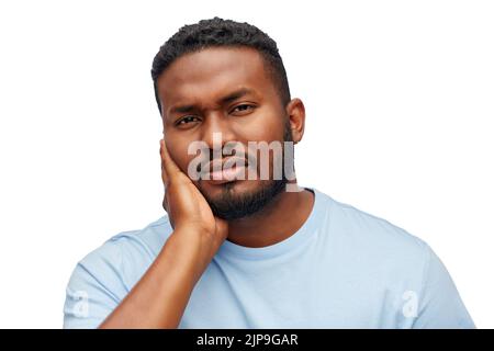 african american man suffering from toothache Stock Photo
