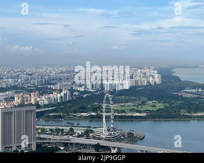 An aerial view of the Singapore Flyer, with Marina South golf course in Singapore Stock Photo