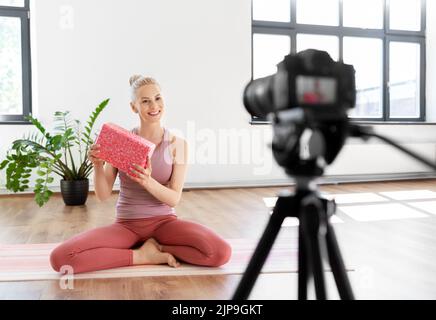 woman or sports blogger streaming online at home Stock Photo