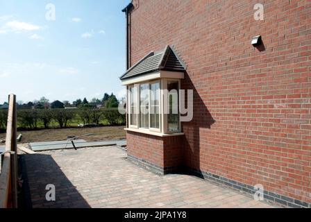 Wall between and windows of newly constructed houses building site ...