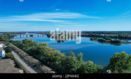 Aerial  view over Tejo river towards the Queen Maria Amelia Bridge, in Santarem, Portugal Stock Photo