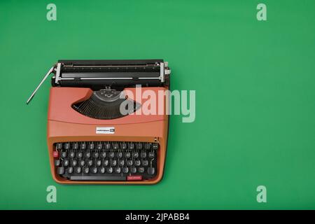 Photograph of a 1970's Underwood 20 typewriter on chroma green background. Stock Photo