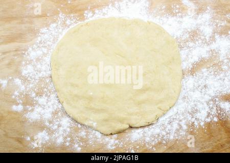 Preparing easter gingerbread cookies. Steps of making pastry. Festive dessert Stock Photo