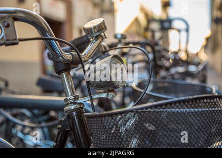 Closeup of old vintage bicycle headlight. Stock Photo