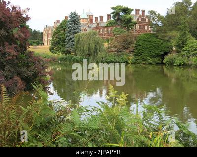 A view across the lake in the grounds of the Sandringham estate, looking towards the House, where the Queen spends about two months each winter.