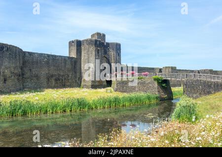 Main Gatehouse and Moat, Caerphilly Castle, Caerphilly (Caerffili), Caerphilly County Borough, Wales (Cymru), United Kingdom Stock Photo