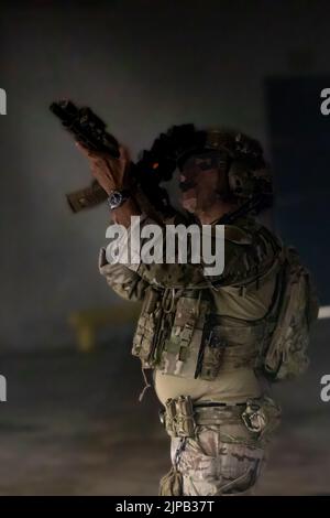 An operator scans the rafters for hazards and hostiles during a ...