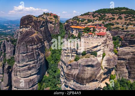 stunning aerial view of the famous monasteries on the tops of stone pillars in Meteora, Greece. High quality photo Stock Photo
