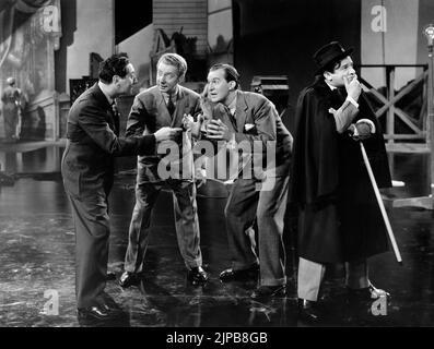 Jack Benny (2nd right), with Yacht Club Boys, on-set of the Film, 'Artists and Models', Paramount Pictures, 1937 Stock Photo