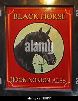 The Black Horse - Hook Norton Ales classic pub sign, Oxfordshire craft ales, Hook Norton, Banbury, Oxen, England, UK,  OX15 5NY Stock Photo