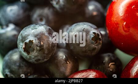 Full-frame shot of blueberries and cherries Stock Photo
