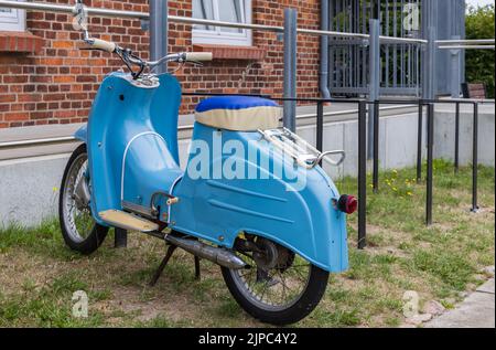 Retro light blue scooter Simson Schwalbe moped Stock Photo