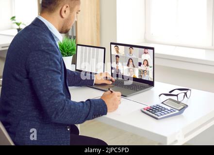 Remote team of business professionals having online work meeting via conference call Stock Photo