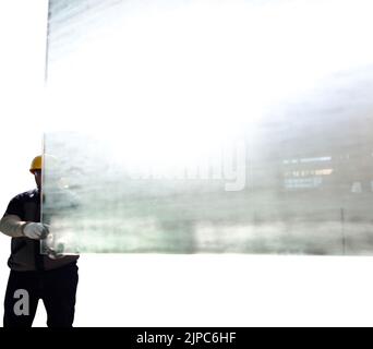 Glass manufacturing factory. Workers in the factory. Stock Photo