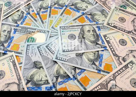 Hundred and five bills as background Stock Photo