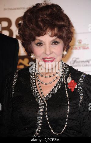 File photo dated November 26, 2010 of Gina Lollobrigida attending the 10th Monte Carlo Film Festival at the Grimaldi Forum in Monaco. Italian cinema icon Gina Lollobrigida will run for the Senate in her country's elections next month, weeks after celebrating her 95th birthday. The elections were triggered after Italy's President Sergio Mattarella dissolved Parliament in July following the resignation of the country's Prime Minister Mario Draghi. Lollobrigida, who joined the Hollywood Walk of Fame in 2018, is standing as the candidate for the Sovereign and Popular Italy Party in the city of Lat Stock Photo