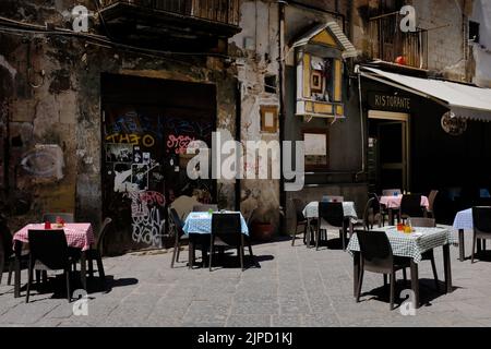 Empty cafe, restaurant tables in Naples, Napoli. Stock Photo
