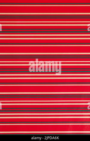 Close up of striped christmas wrapping paper as background full frame Stock Photo