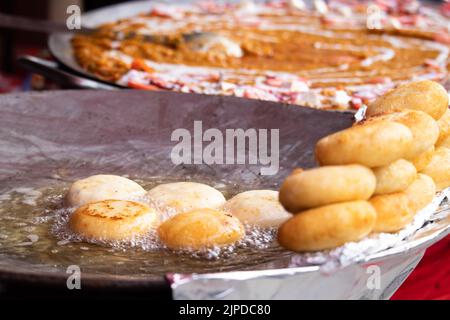 Deep Frying Favorite Indian Street Food Aloo Chaat Tiki Chat Or Alu Chaat Tikki Made Of Boiled And Mashed Potato In Hot Boiling Refined Oil On Large T Stock Photo