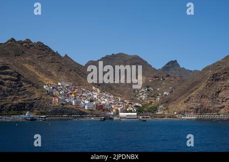 San Andres on the island of Tenerife seen from the sea with mountains in the background. Stock Photo