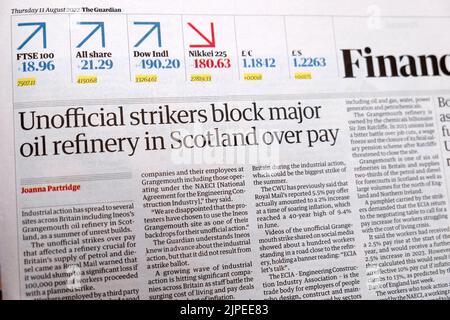 'Unofficial strikers block major oil refinery in Scotland over pay' Guardian Financial newspaper headline strike article 11 August 2022 London UK Stock Photo