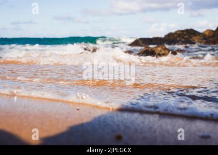 View of the sea breaking on the beach. Salvador, Bahia, Brazil. Stock Photo