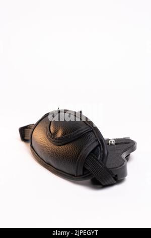 black leather camera strap on white background. Stock Photo