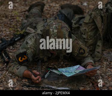 Aug 16, 2022 - Fort Hood, Texas, USA - Sergeant Andrew Row from 2nd Brigade Combat Team Strike 101st Airborne Division (Air Assault), 18th Airborne Corps, plots the direction on a map that will be taken to reach an ambush point during the FORSCOM Best Squad Competition on Fort Hood, Texas, August 16, 2022. Each of these events are designed to test the physical and mental toughness along with the lethality of each squad to see which squad will represent FORSCOM at the Best Squad of the Army competition that will take place at Ft. Bragg. (Credit Image: © U.S. Army/ZUMA Press Wire Service/ZUMAPRE Stock Photo