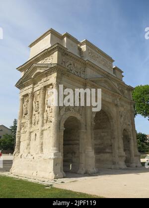 The Triumphal Arch of Orange is an Ancient Roman monumental gate, originally built in the first century and now a well-preserved historic landmark. Stock Photo