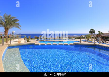 Outdoor swimming pool in Sharm El Sheikh resort in Egypt Stock Photo