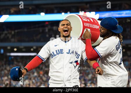 August 27, 2022, Toronto, ON, Canada: Former Toronto Blue Jays pitcher Juan  Guzman takes video of the crowd during the 30th anniversary celebration of  the Jays first World Series title in 1992