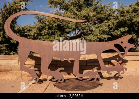 Metal Statue Rendering Of Mountain Lion Petroglyph Near Blue Mesa in Petrified Forest National Park Stock Photo