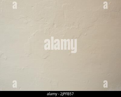 Color Wall after Paint with a Paint Roller and Brush. Home renovating with color Stock Photo