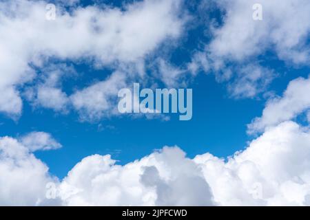 Background from the blue sky in the gap of white clouds a beautiful view Stock Photo